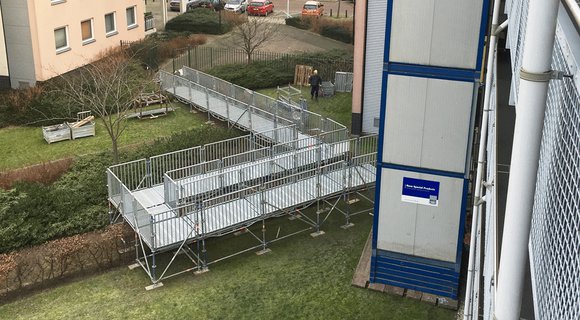 Temporary passenger lifts and wheelchair ramp at Steenhouwersgaarde in The Hague