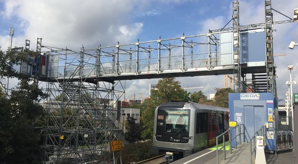 Temporary railway footbridge deployed at metro station in Amsterdam (NL)